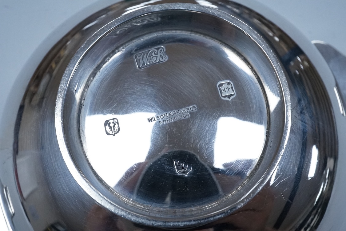 A George V Scottish silver quaich, by Wilson & Sharp, Edinburgh, 1924, 14.4cm over handles, engraved 'Merchant Golf Club, Luffness, 1936', 3.5oz.